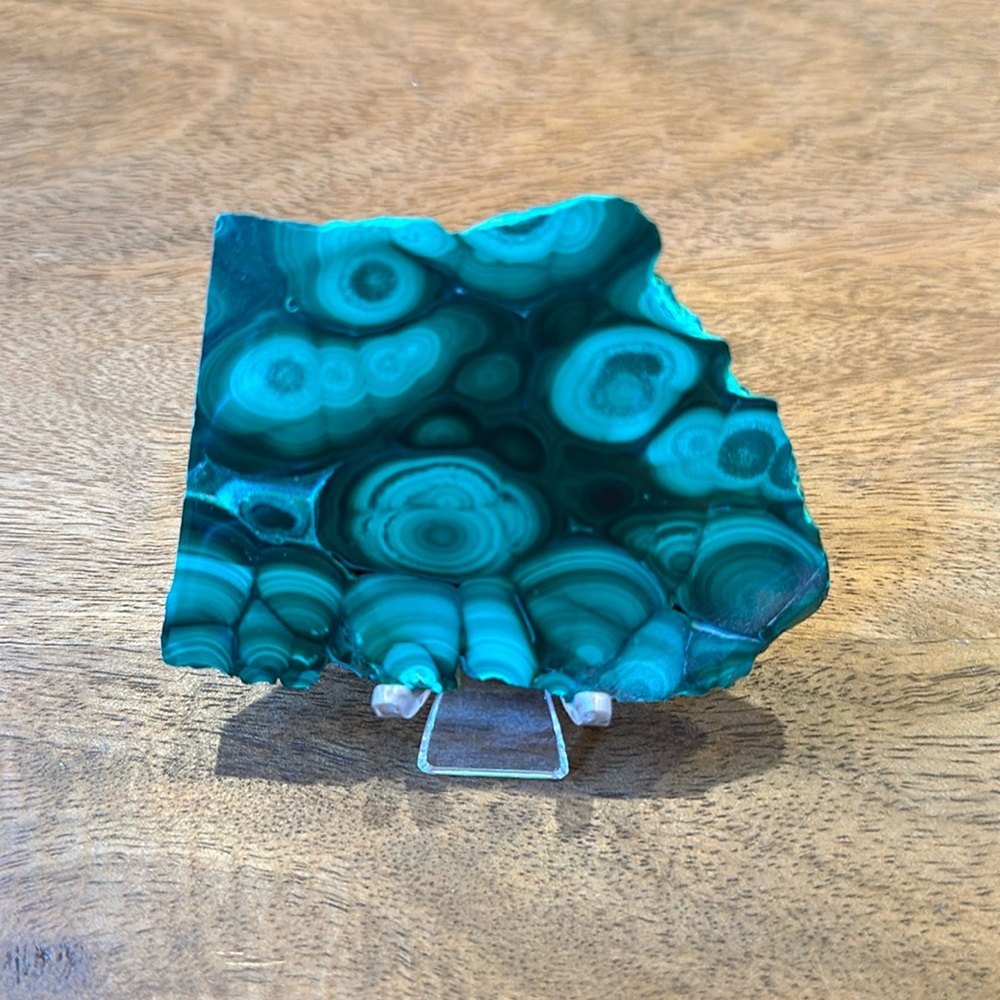 Malachite slice on stand